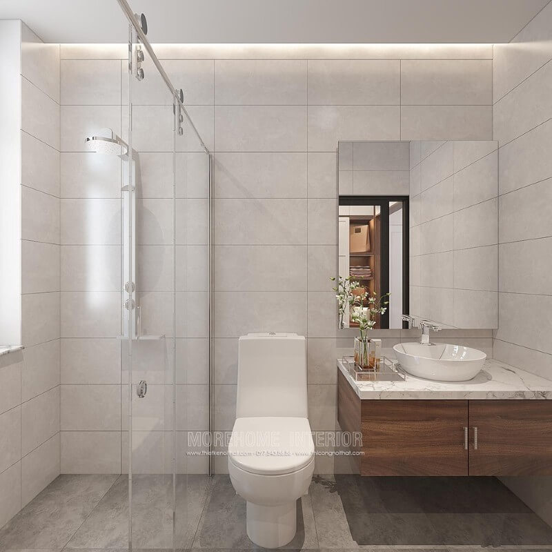Thiết kế phòng tắm đẹp và hiện đại với ý tưởng sử dụng gam màu đơn sắc màu xám chủ đạo kết hợp chất liệu gỗ óc chó. Mẫu thiết kế sẽ là lựa chọn rất phù hợp trong các không gian vừa và nhỏ như chung cư, nhà phố, nhà liền kề,.. Thiết kế nội thất chung cư cao cấp